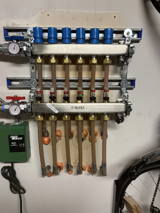 Plumber performing Water Heater Repair at a residential property in Mount Angel